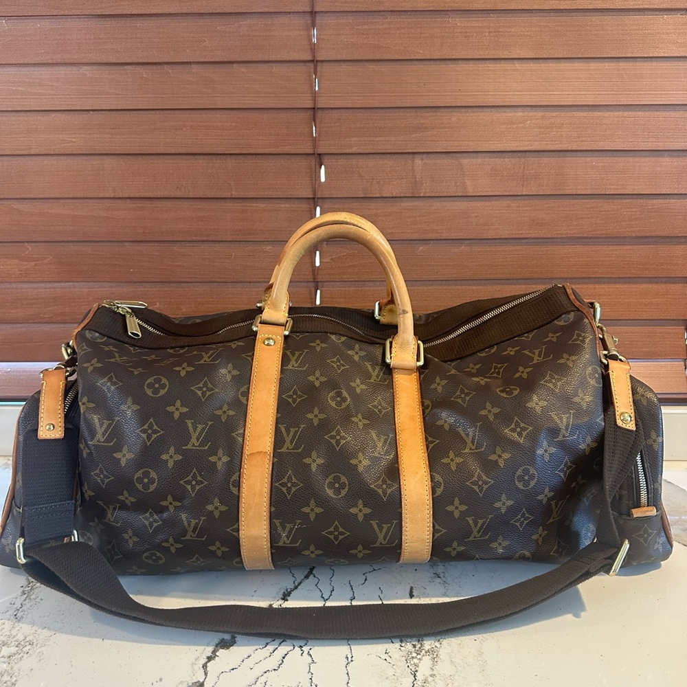 Louis Vuitton Brown Monogram duffle and dust bag